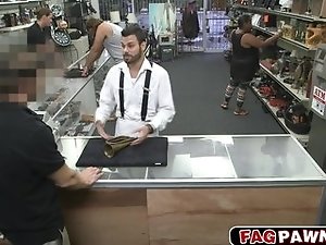 Sexy gay blows a cock in public store